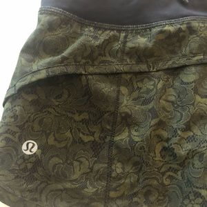 Size 4Speed shorts. Green and black lace print
